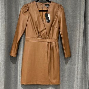 Bloomingdales. Faux Leather dress. Great to wear to a concert! 😄😁